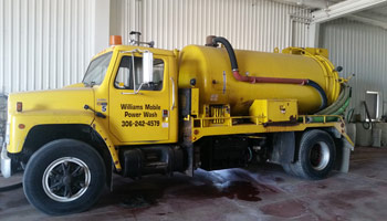 Yellow vacuum truck